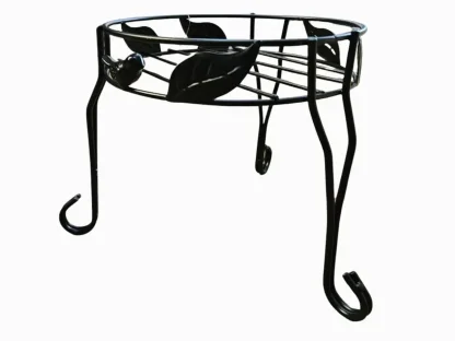 סטנד מתכת שחור עם עיטור עלים וציפור