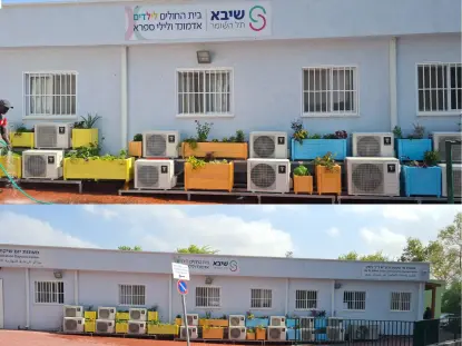 הבנין כולו עם אדניות והצמחים שלנו